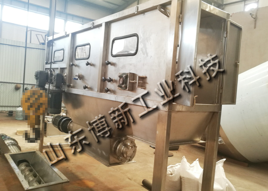 韶關50KG硝銨自動拆包機 配套管鏈輸送機現場